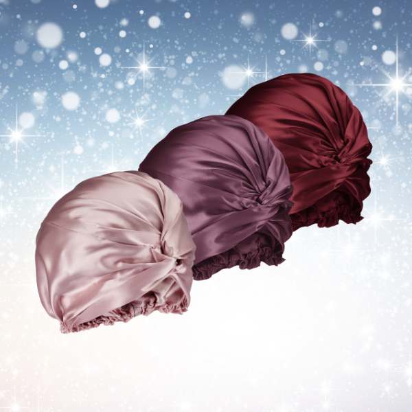 Blissy silk bonnets in pink, plum, and burgundy made from highest quality silk for gentle hair care
